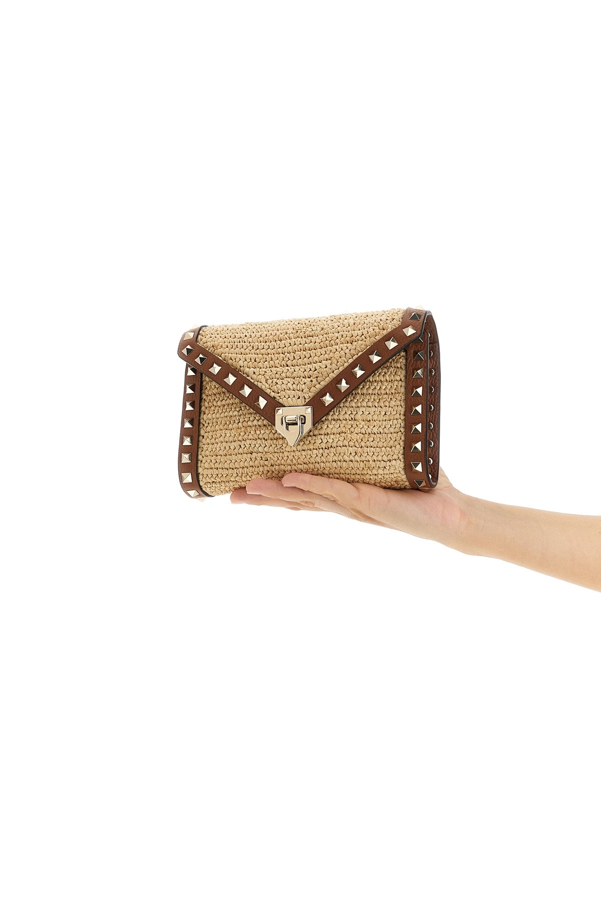 rockstud mini crossbody bag in woven natural raffia