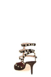 valentino garavanis rockstud pumps redefine the classic silhouette through a
