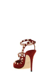 the valentino garavani rockstud pumps define the aesthetics of the maison throug