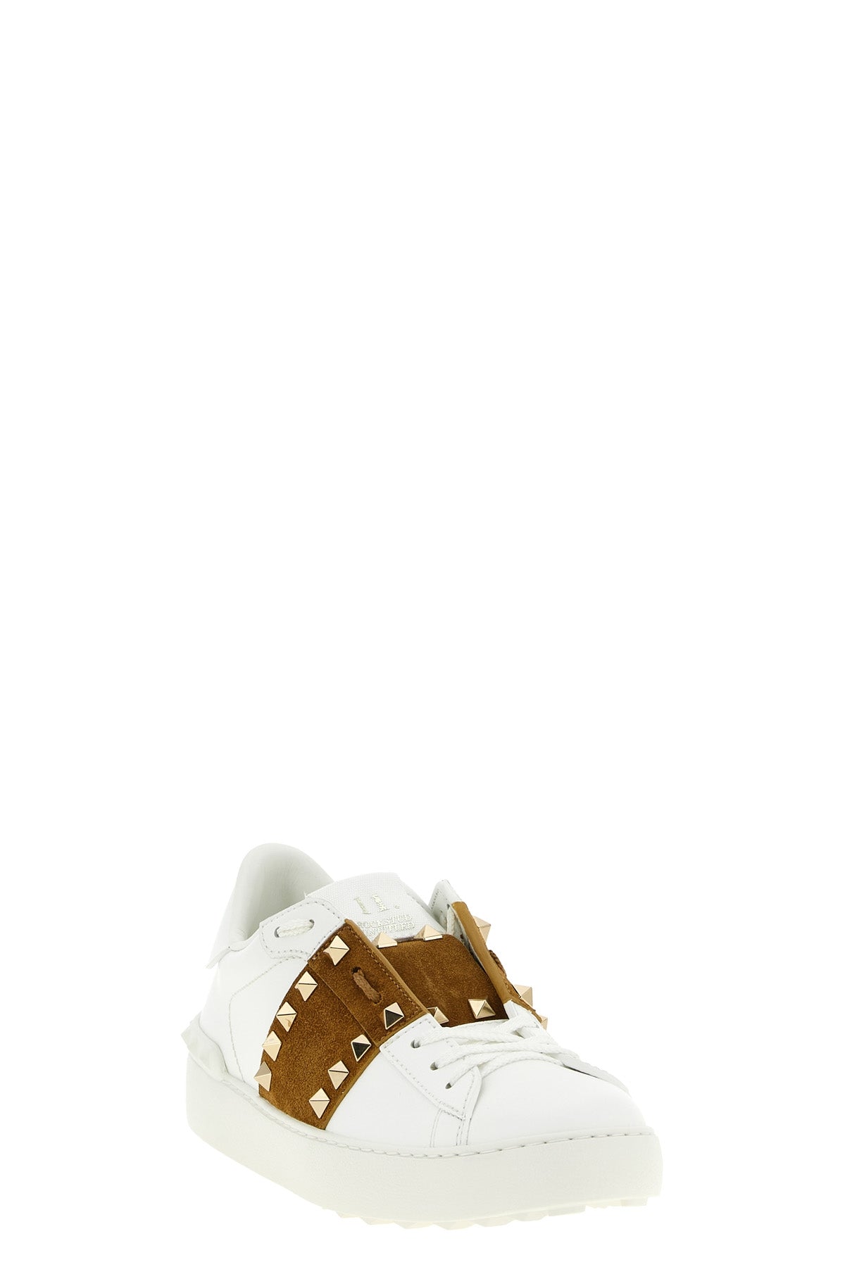 the valentino garavani rockstud untitled sneakers redefine everyday luxury thr