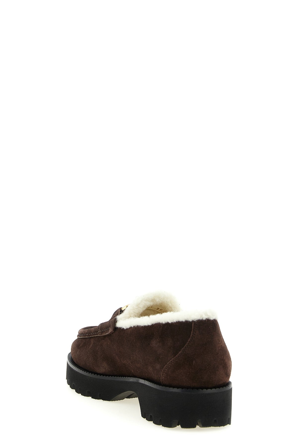 valentino garavani loafers redefine everyday elegance through a structured silho
