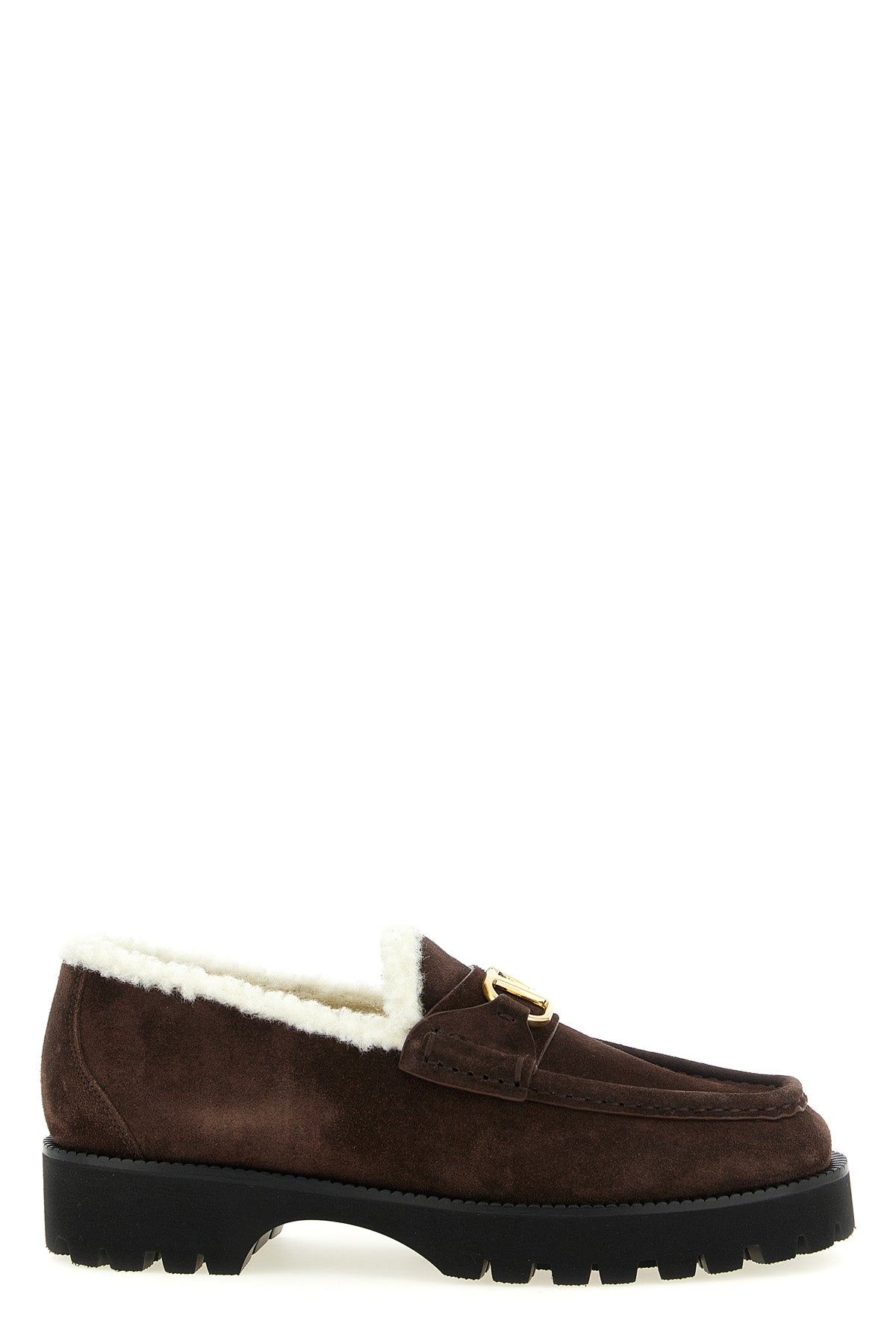 valentino garavani loafers redefine everyday elegance through a structured silho