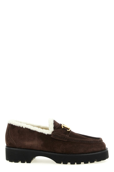 valentino garavani loafers redefine everyday elegance through a structured silho