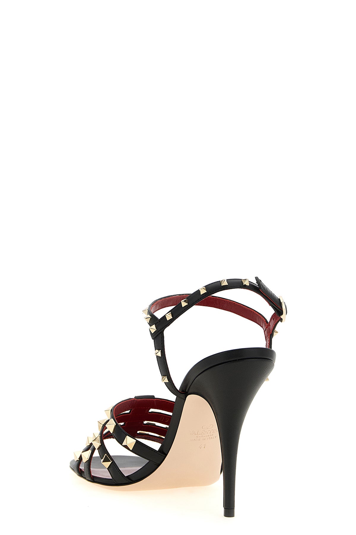 valentino garavani sandals define a bold silhouette through a construction in fi