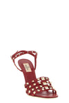 the valentino garavani rockstud high-heeled sandal defines a bold shape through