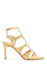 light bronze leather sandals with adjustable straps and medium heel