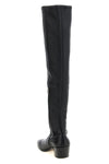 tom fords cuissardes boots redefine the silhouette