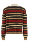 the guest in residence grizzly cropped rugby crop polo shirt stands out for it