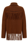 the guest in residence western fringe knitted jacket redefines frontier codes