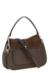 the furla flow m handbag has a structured shape defined by a sophisticated play