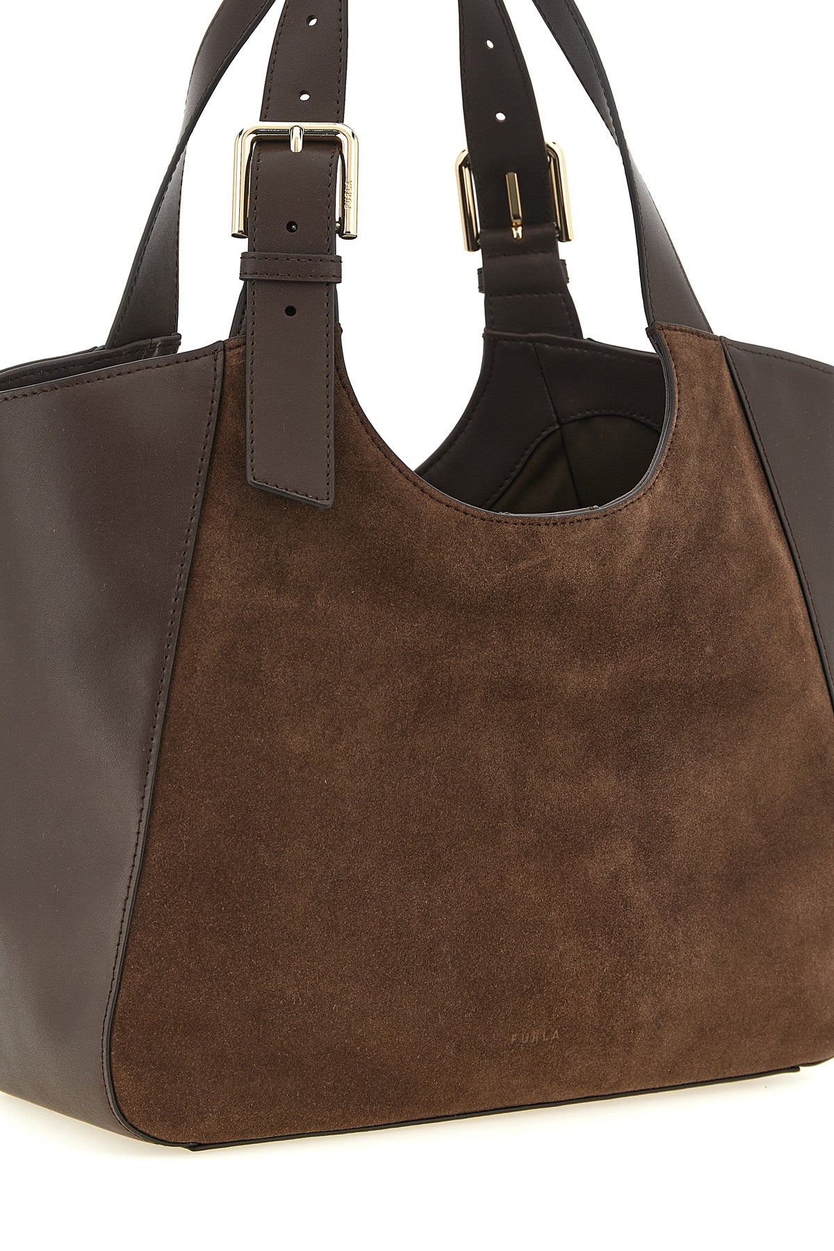 the furla dora m tote bag defines a new everyday geometry through a clever pla