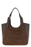 the furla dora m tote bag defines a new everyday geometry through a clever pla