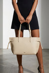 the furla ava m tote bag defines a structured silhouette through the use of fi