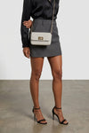 the furla 1927 mini crossbody bag is made of fine hammered calf leather