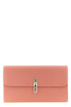 the furla iride clutch defines a minimalist aesthetic through a flat and structu