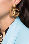 gold metal earrings