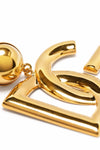 gold metal earrings