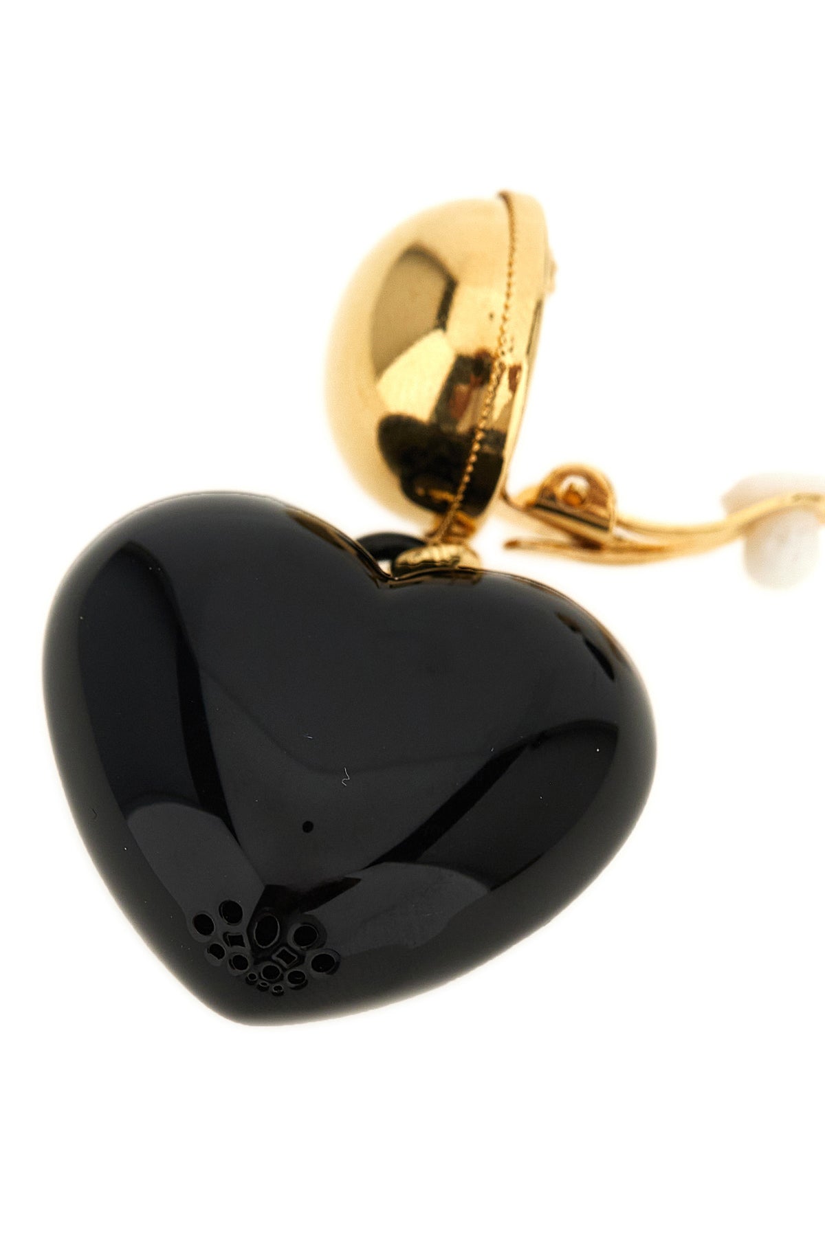 the dolce & gabbana clip earrings are distinguished by a pendant silhouette