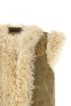 the etro vest in fine shearling stands out for its sartorial construction that e