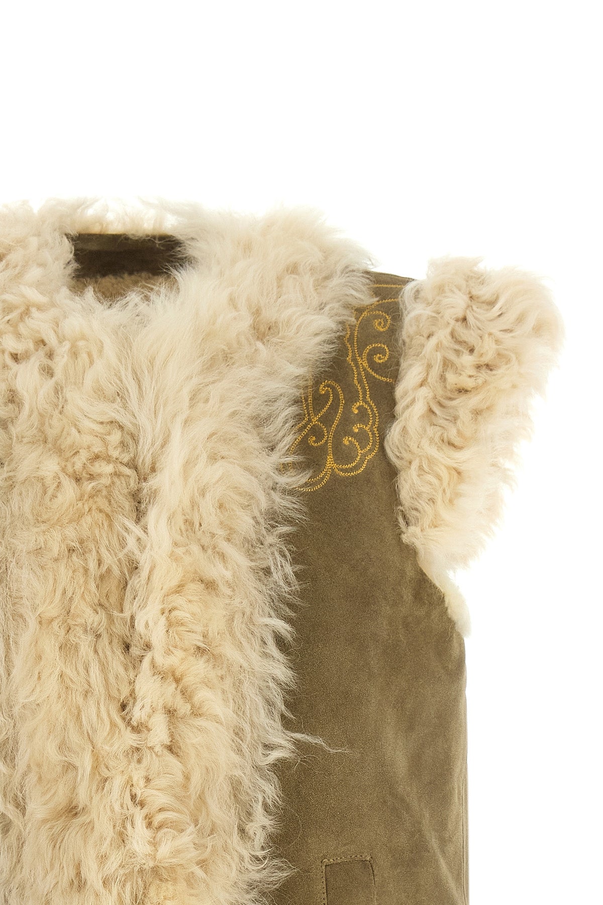 the etro vest in fine shearling stands out for its sartorial construction that e