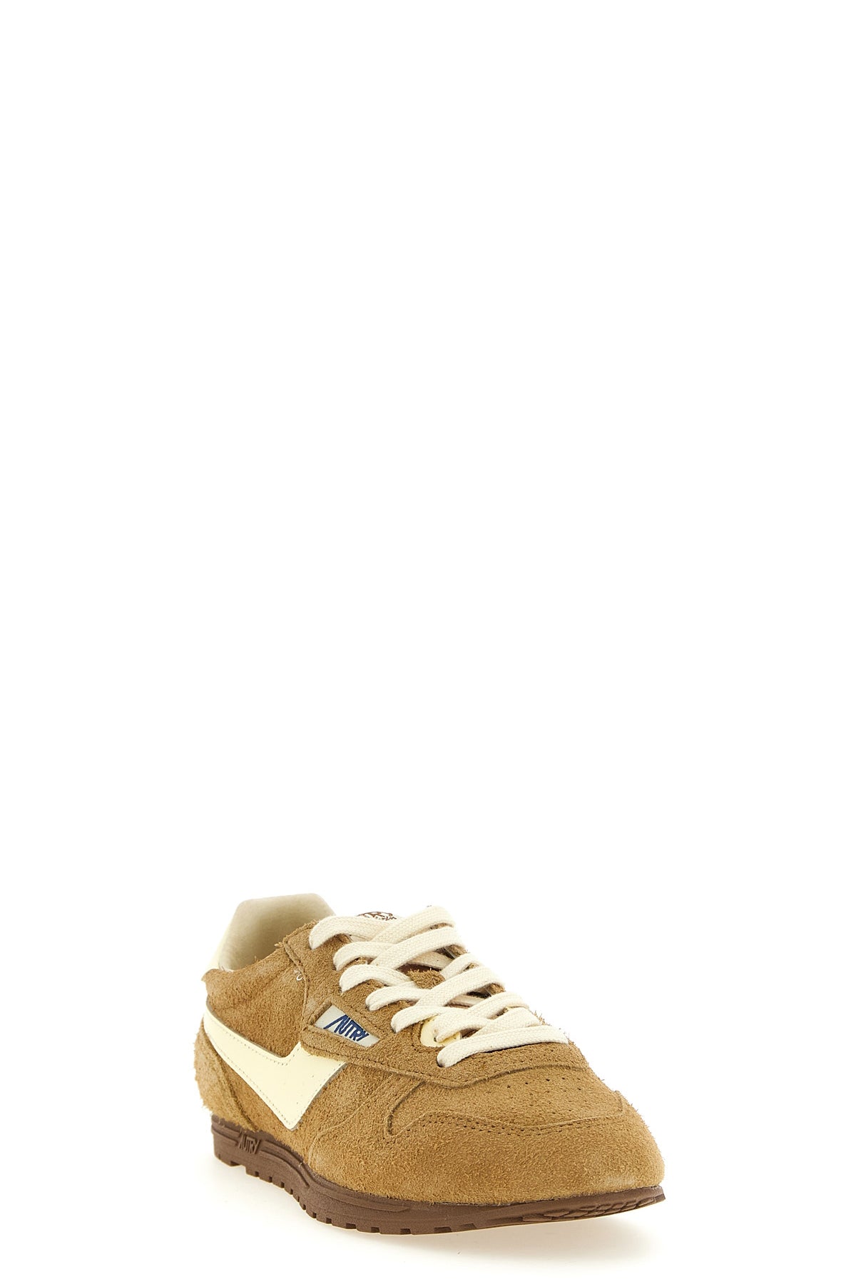 autry windspin low sneakers redefine vintage sporty aesthetics through world-c
