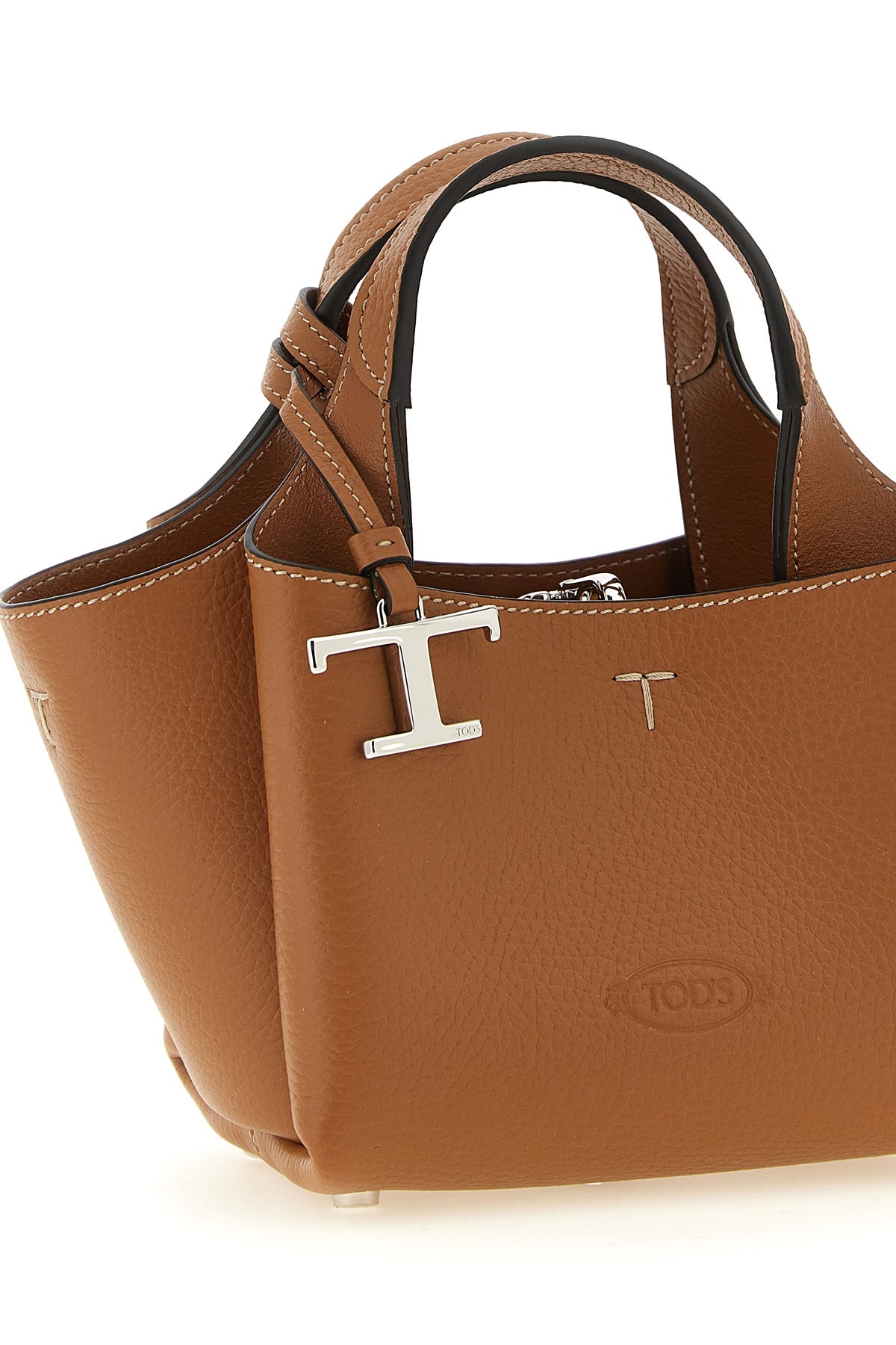 the tods micro handbag is made of fine grain calf leather in the leather nuance