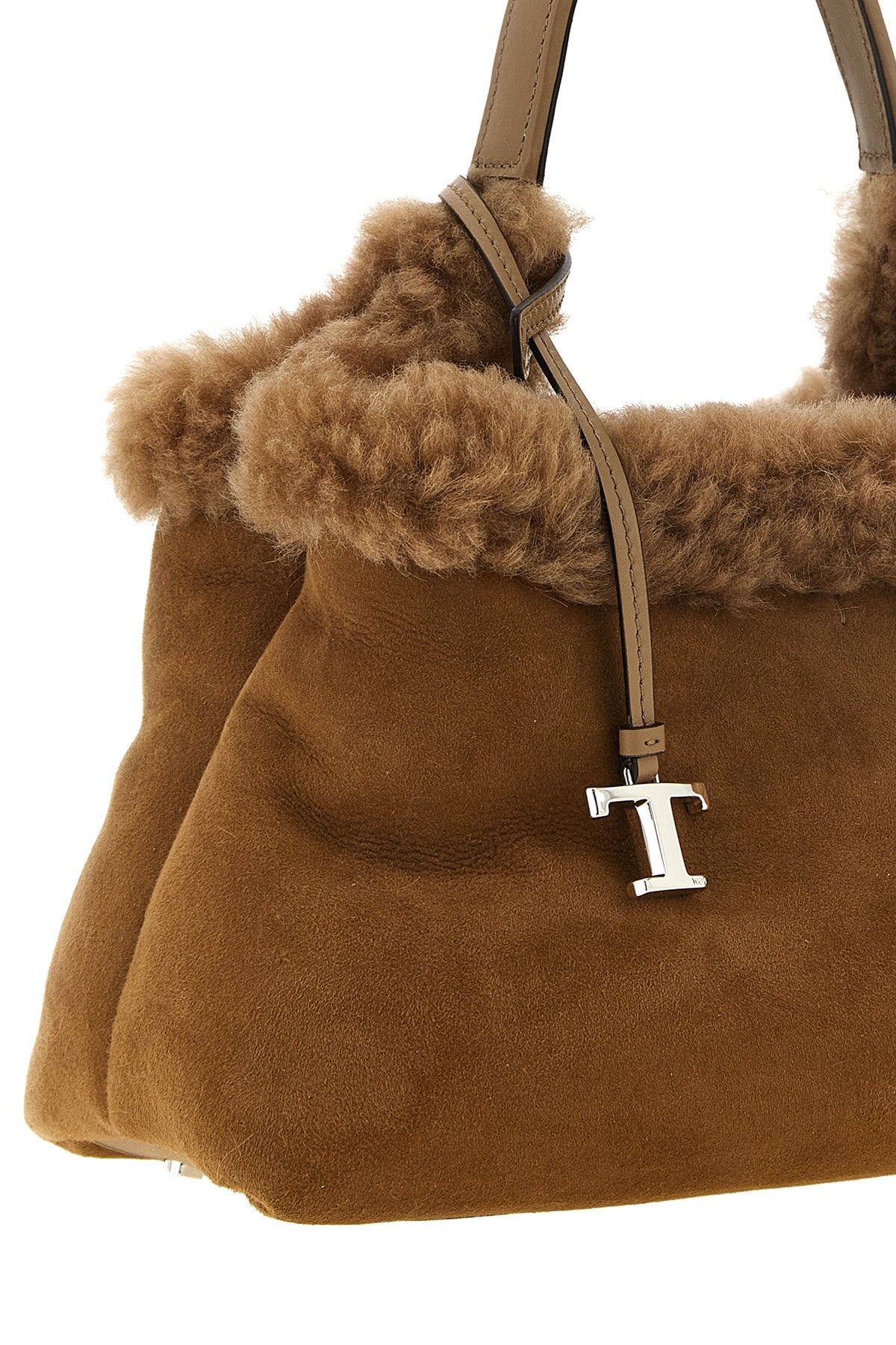 the small handbag tods embodies a timeless material elegance