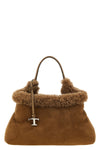 the small handbag tods embodies a timeless material elegance