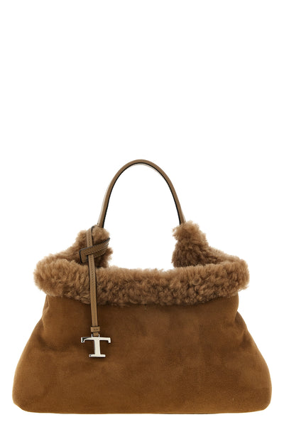 the small handbag tods embodies a timeless material elegance