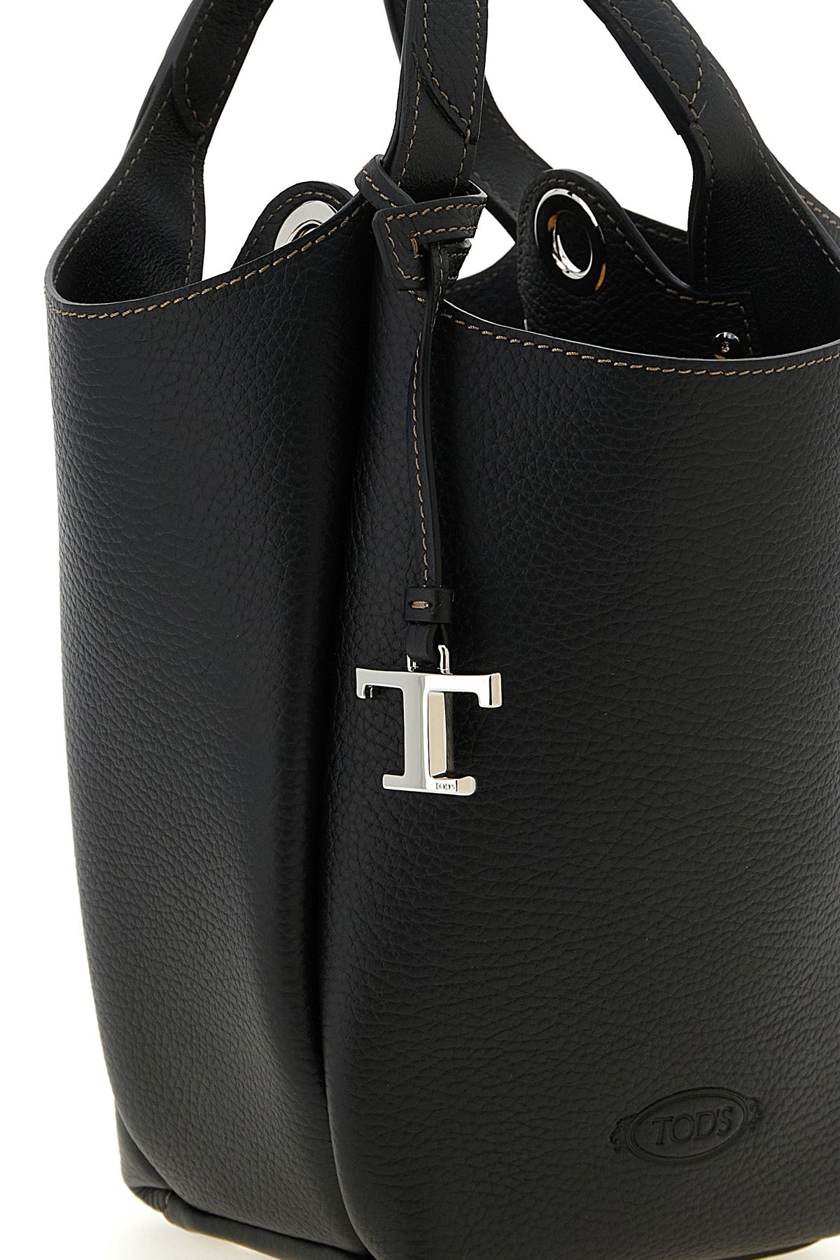 the tods mini bucket bag is made of fine black hammered calf leather