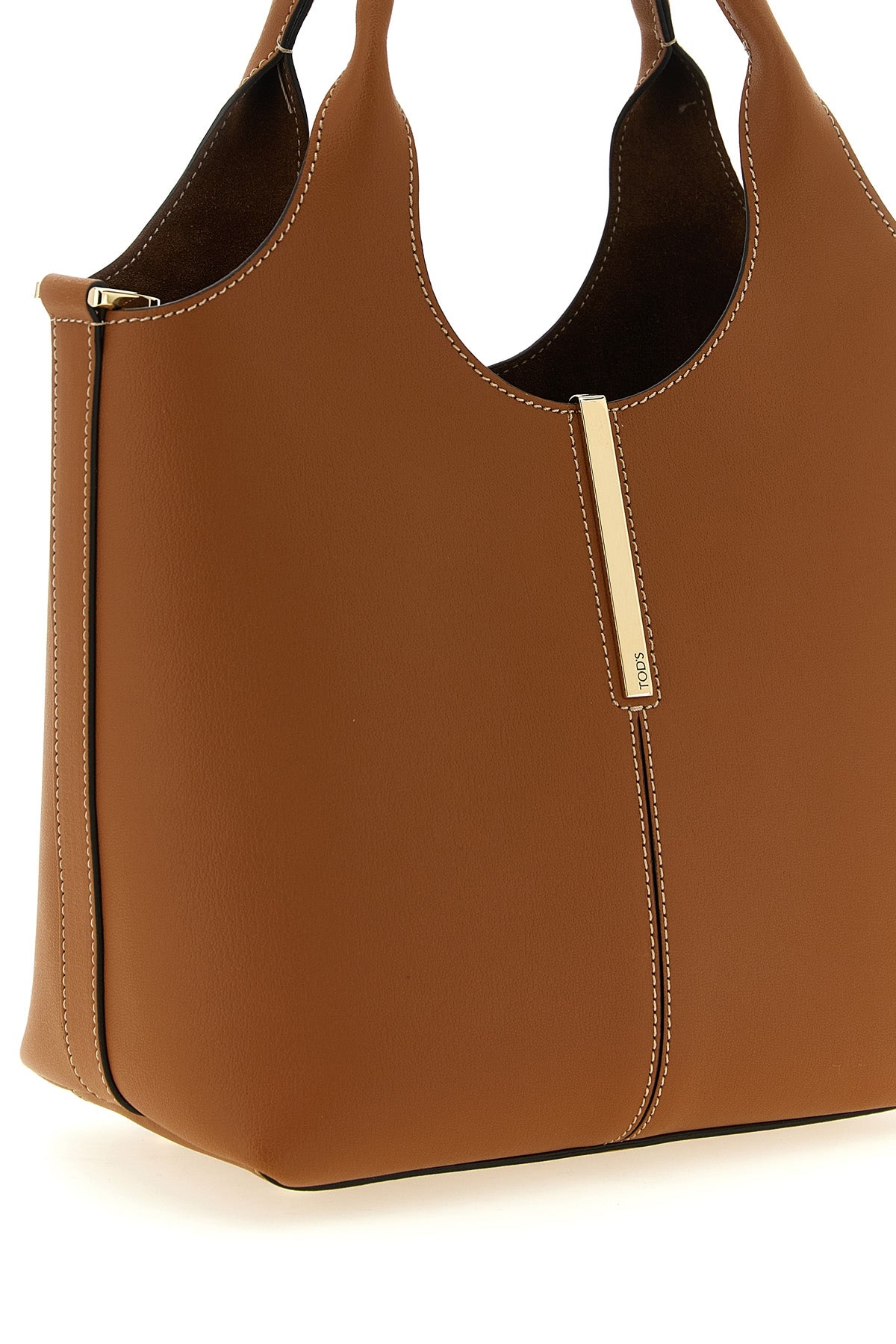 the tods mini tote bag sets a new standard of everyday luxury through a structu