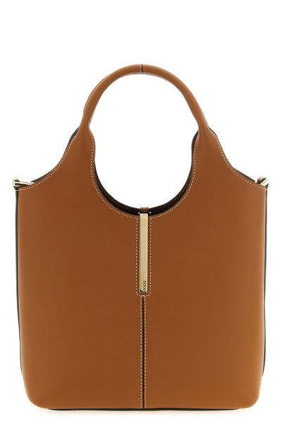 the tods mini tote bag sets a new standard of everyday luxury through a structu