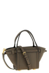 the tods tim mini shopping bag defines a contemporary structure through preci