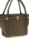the tods tim mini shopping bag defines a contemporary structure through preci