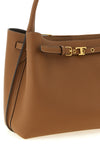 the handbag tods tim top handle piccola stands out for a structured silhouette