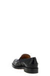 the moccasin tods defines the wardrobe through a rigorous construction