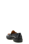 the tods moccasins has a structured construction that blends classic elegance