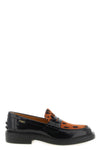 the tods moccasins has a structured construction that blends classic elegance