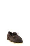 tods moccasins redefine winter elegance through meticulous construction