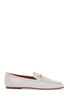 white calfskin moccasin with gold bar and velcro closure