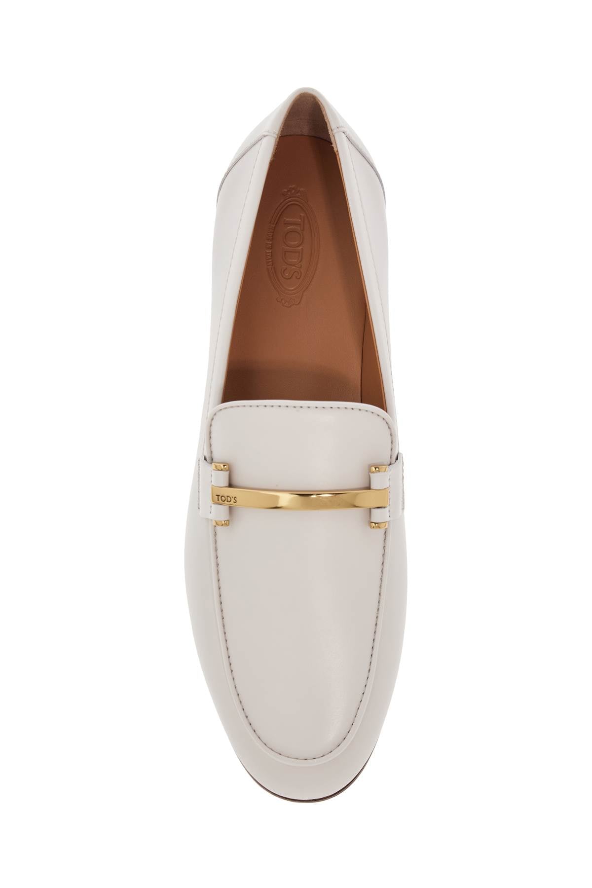 white calfskin moccasin with gold bar and velcro closure