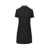 VALENTINO 40 crepe couture mini dress with animalier bow