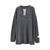 inside-out knit oversized sweater