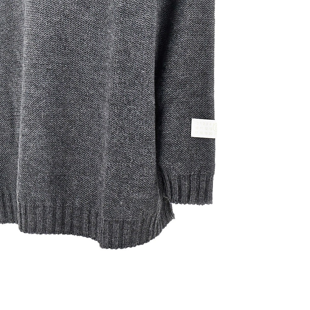 inside-out knit oversized sweater