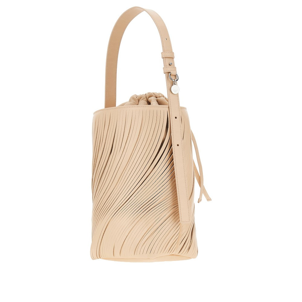 fringed cut leather bucket bag
