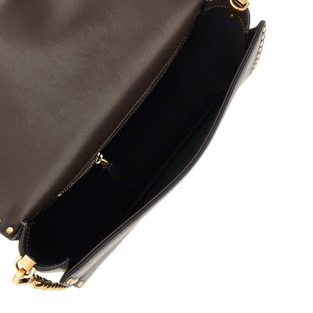 love one slouchy leather bag with studs