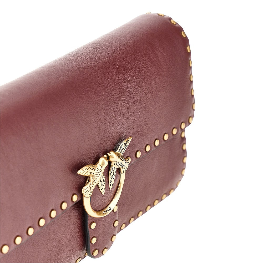 love one slouchy leather bag with studs