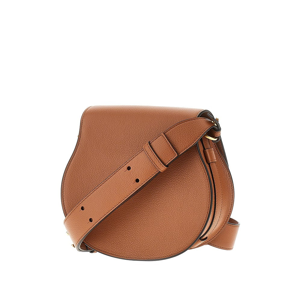 grained leather marcie saddle bag