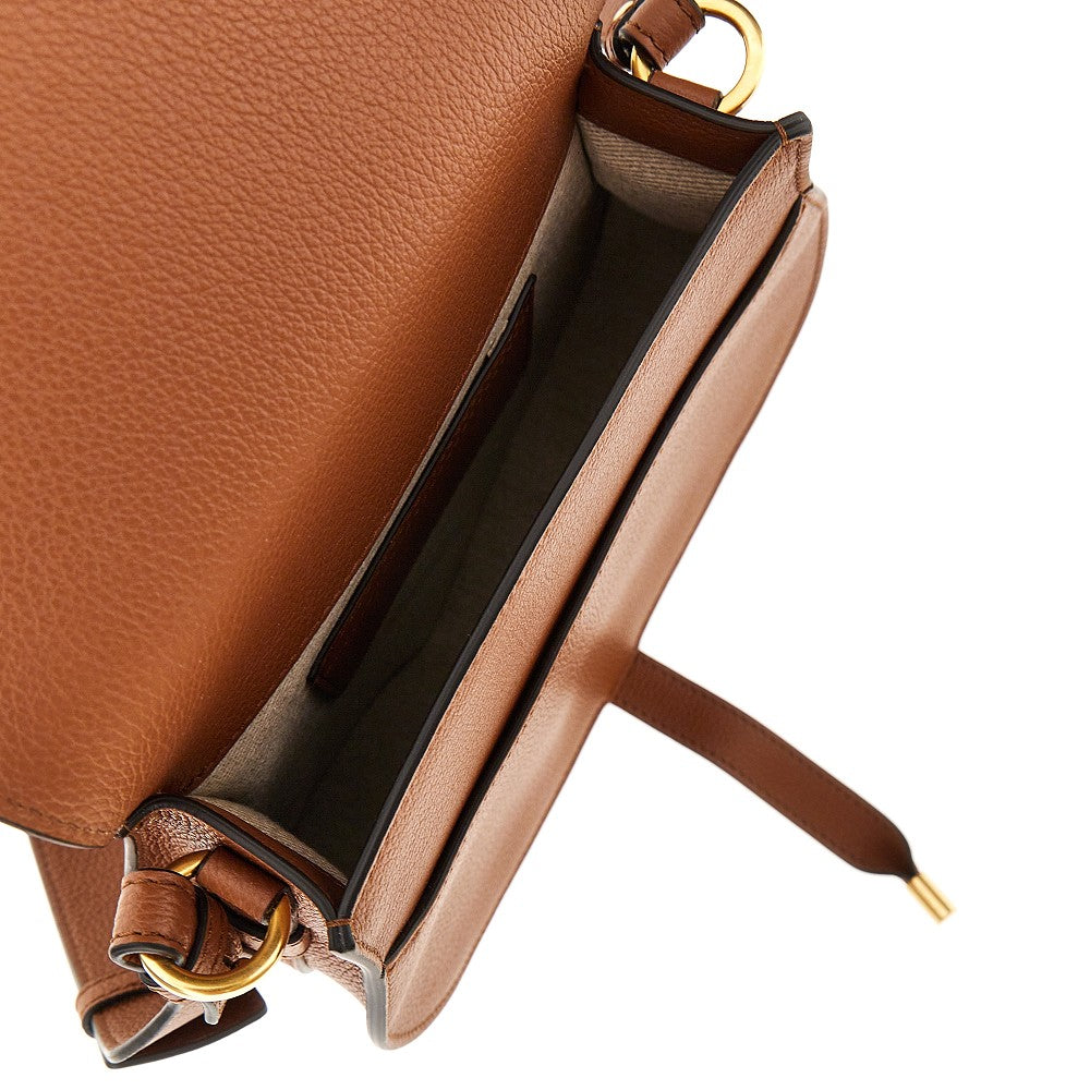 grained leather marcie saddle bag