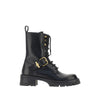 leather boots with medusa detail